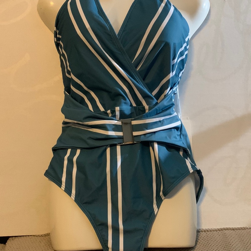 One piece swim suit with neck tie, back out, belt attached ready for summer